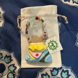 Porcelain small purse with beaded handle from care & wonder co.